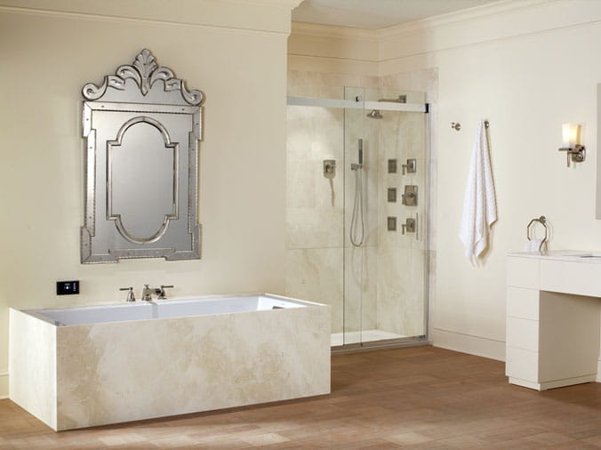 Bathroom with Kohler bathtub and shower enclosure