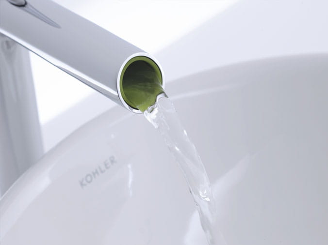 Closeup of Kohlet chrome faucet with green interior