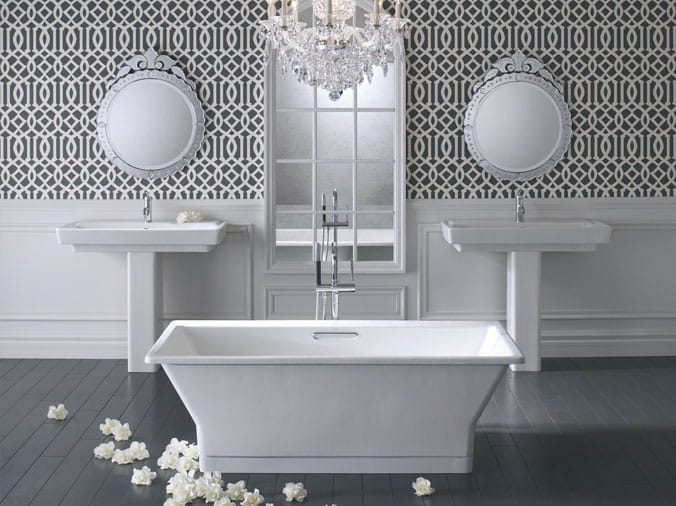 Twin Kohler pedistal sinks and a Kohler free-standing bathtub
